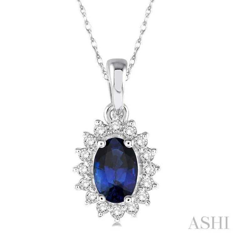 1/8 Ctw Round Cut Diamond and Oval Cut 6x4mm Sapphire Center Sunflower Precious Pendant in 10K White Gold with chain